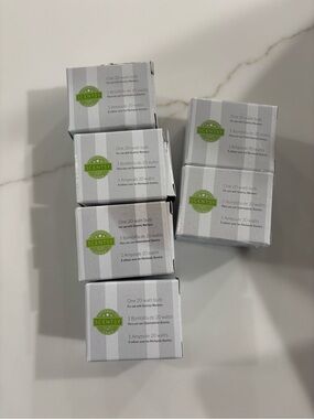 Scentsy Replacement Bulbs with Green Logo on White Boxes